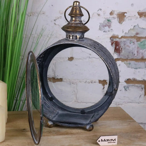 Antique-style devra vintage style round lantern with dark weathered metal finish and ornate detailing