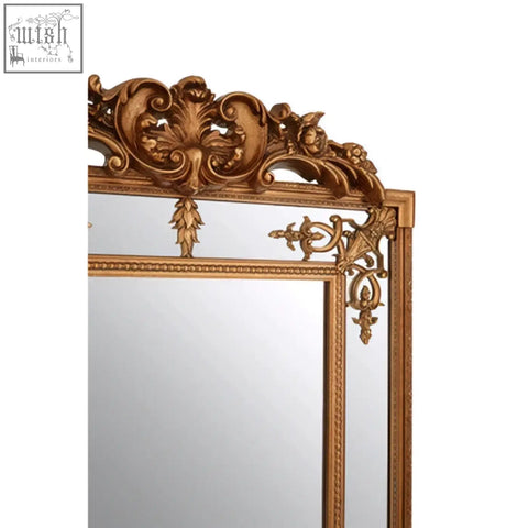 Deymonte ornate mirror with gold finish featuring an ornate frame and intricate baroque-style corner carvings