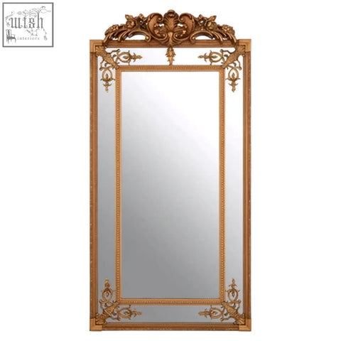 Deymonte ornate mirror with gold finish featuring a gilded frame and intricate baroque-style detailing