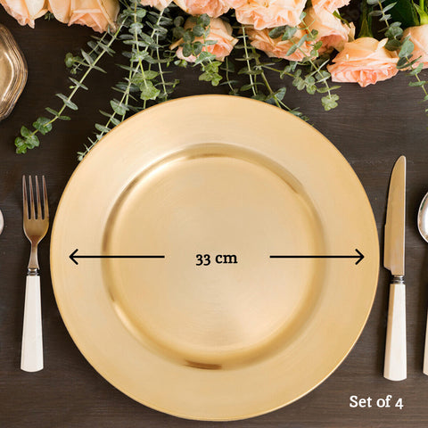 A sleek 33 cm wide gold charger plate with dia gold finish and subtle concentric ridges for elegant dining