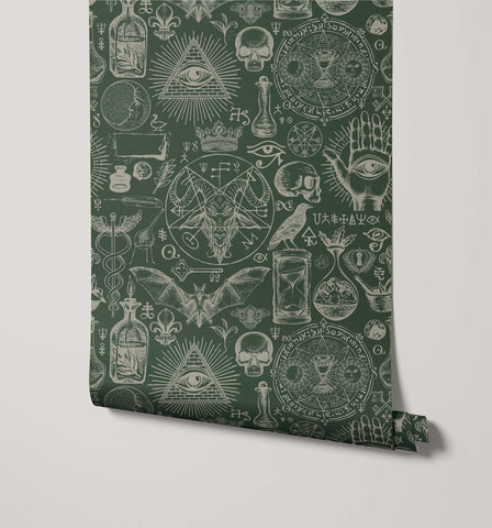 Dark green diablo wallpaper with intricate white line drawings of mystical symbols skulls and occult imagery