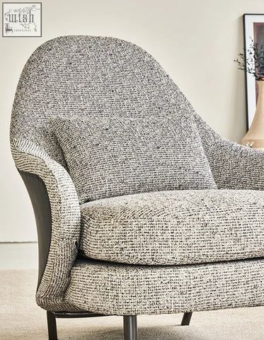 Cozy diakite armchair with footstool in gray white tweed fabric and black metal legs perfect for any living space offers financing