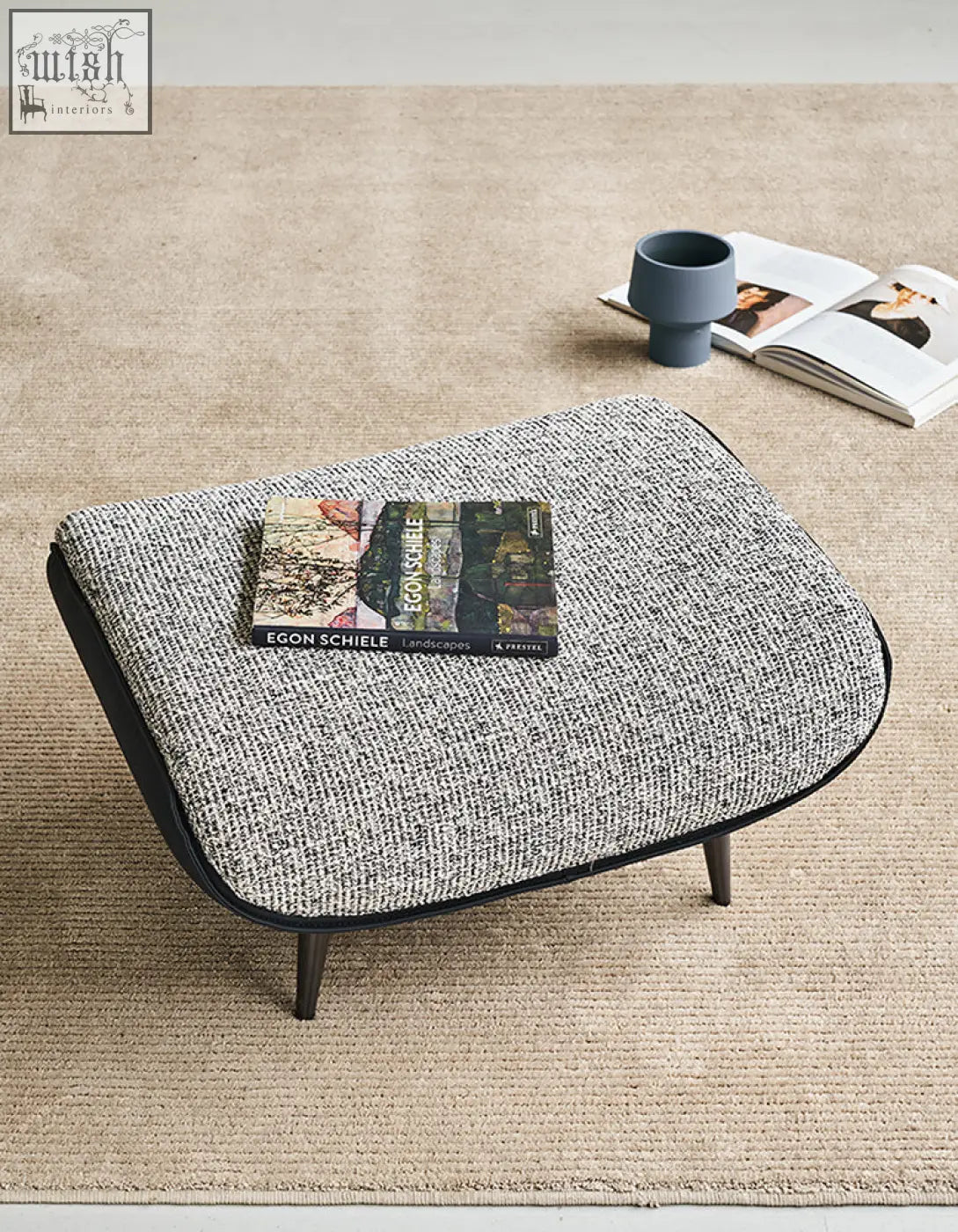 Gray and white linen and leather ottoman with black trim for living space comfort shipping cost and financing offered