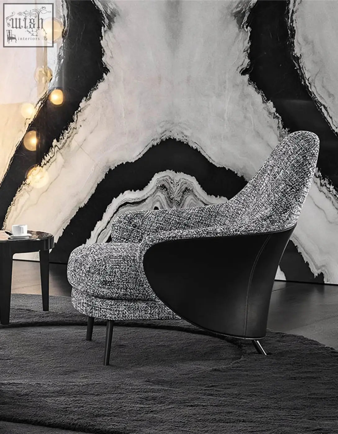 Modern diakite armchair with sleek black leather back and gray tweed fabric perfect for any living space with offer financing