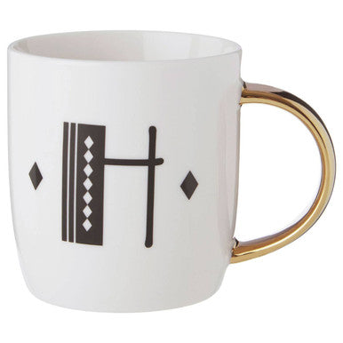 White ceramic mug with gold handle and black diamond accents in diamond deco white style for stylish drinkware