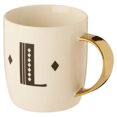 Cream-colored ceramic mug with gold handle and black diamond deco white geometric l monogram lettering
