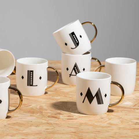 White ceramic diamond deco white monogram mug with gold handles and black lettering perfect for everyday use
