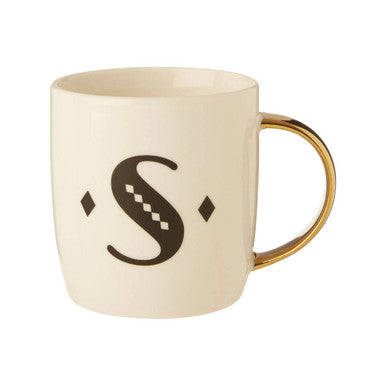 Cream-colored ceramic diamond deco white monogram mug with gold handle and black s design with diamond shapes