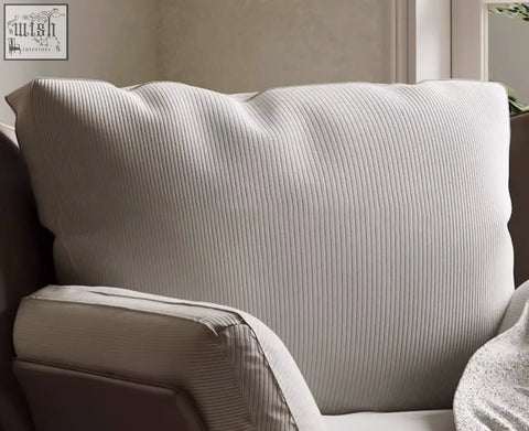 Beige corduroy throw pillow with vertical ribbed texture on dias armchair featuring corduroy upholstery offer financing