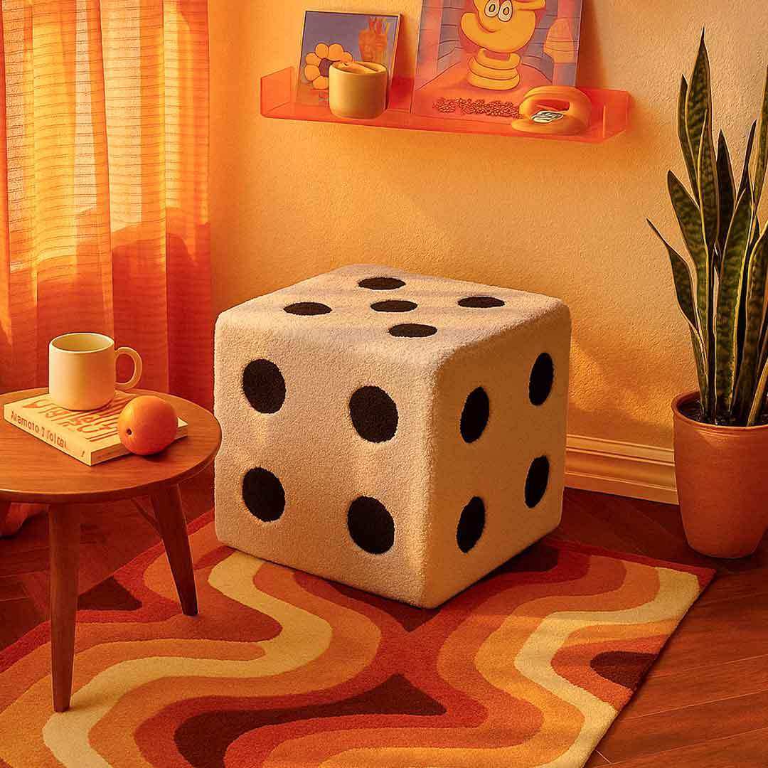 Cream-colored plush dice footstool with black dots soft fabric 22cm x 22cm perfect for cozy seating and decor