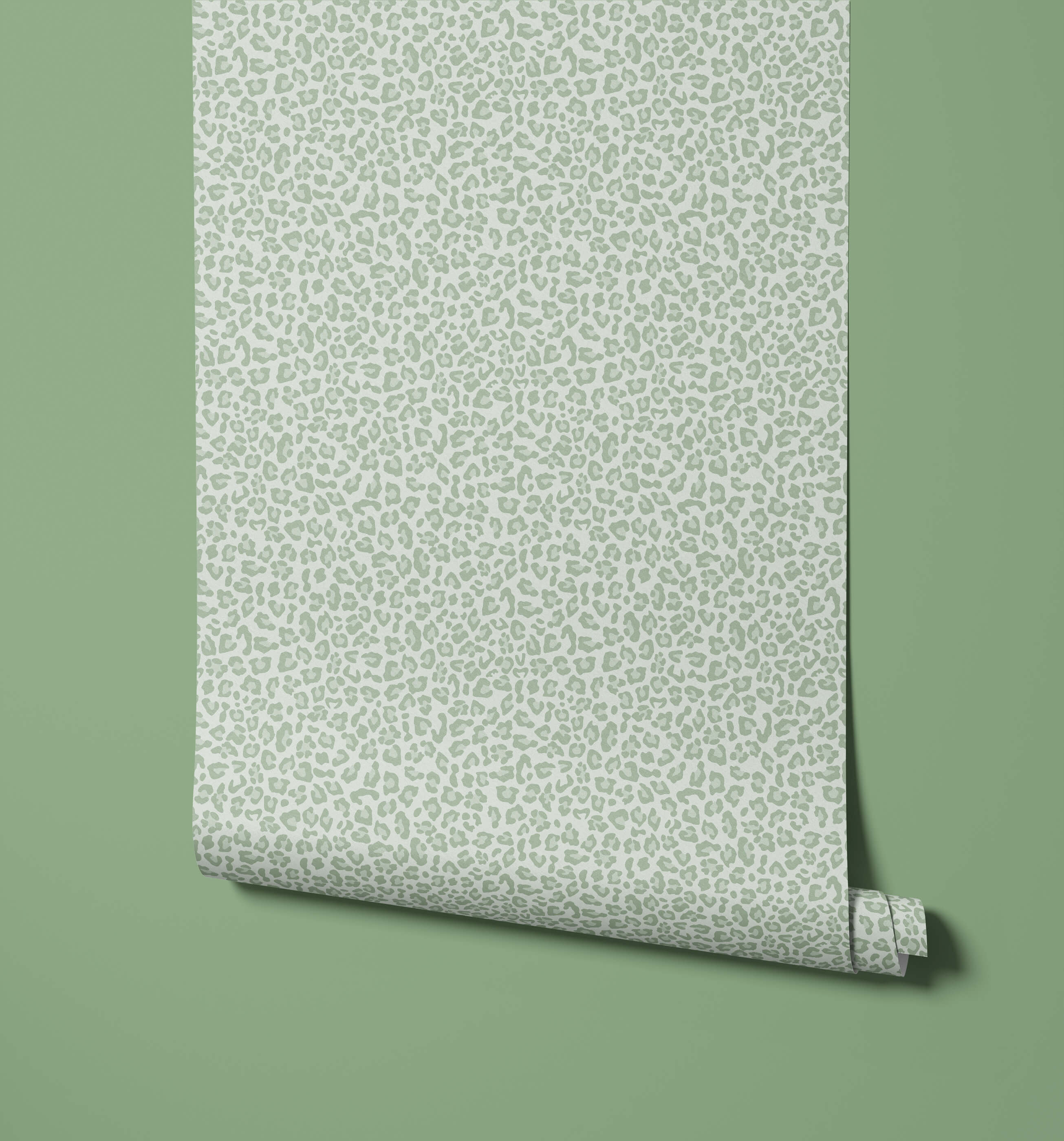A roll of diego light green print wallpaper with subtle leopard print wallpaper and visual texture pattern