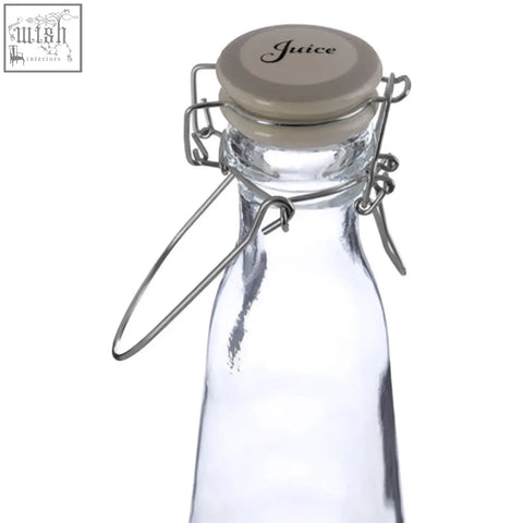 Clear diego juice glass bottle 1000ml with beige screw-top cap and silver metal wire cage sealed for juice storage