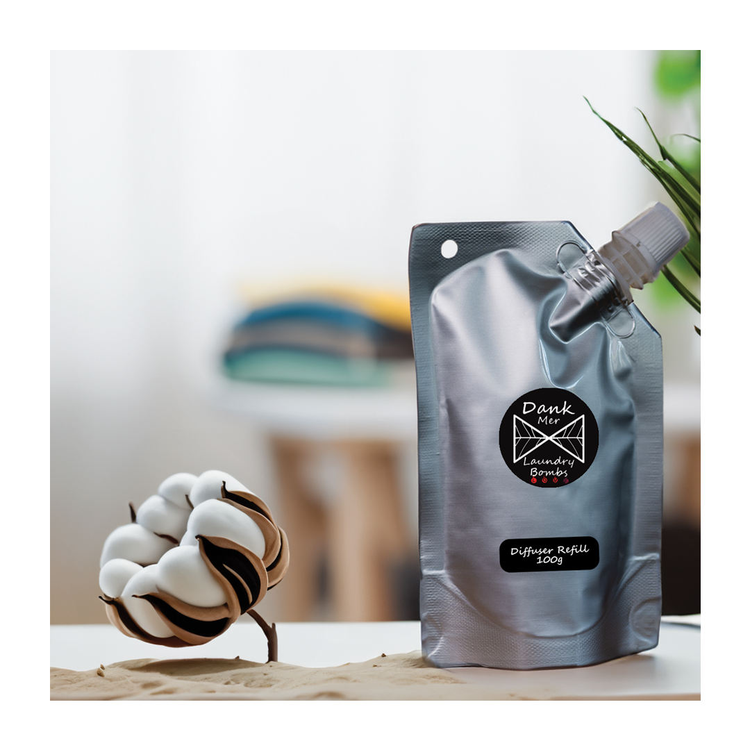 Silver pouch of dank mer laundry bombs diffuser refill 100g with white cap and black circular logo for freshening clothes