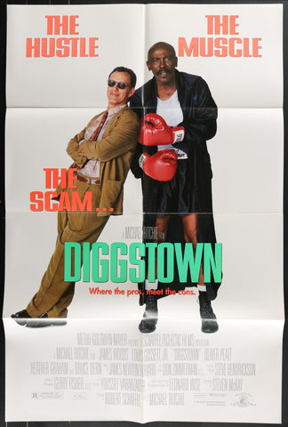 Movie poster for diggstown 1992 shows two men one in tan suit and sunglasses the other in black robe with red boxing gloves