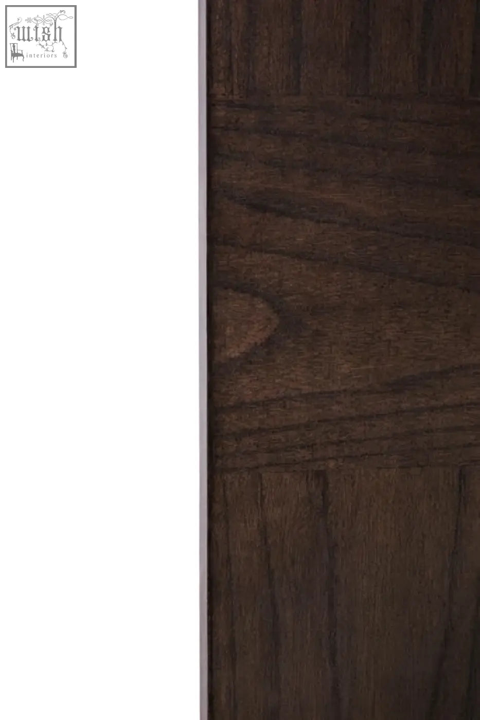 Dark brown wooden door with textured grainy surface and horizontal paneling beside antique grey wall mirror