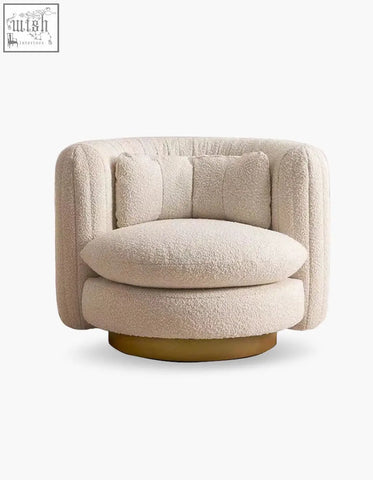 Cream-colored plush dino armchair with boucle fabric and swivel base offers stylish armchair features and financing options