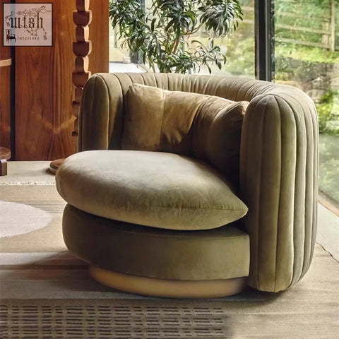 Dino armchair in olive-green velvet with ribbed upholstery and swivel base offers armchair features and financing options