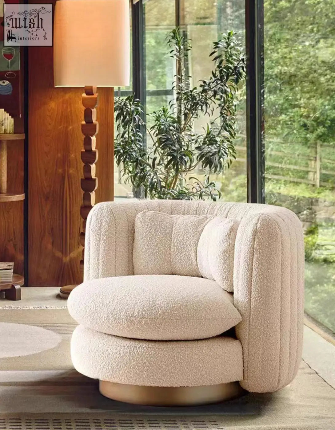 Cream-colored dino armchair features plush boucle fabric with a rounded design and metallic swivel base offer financing available