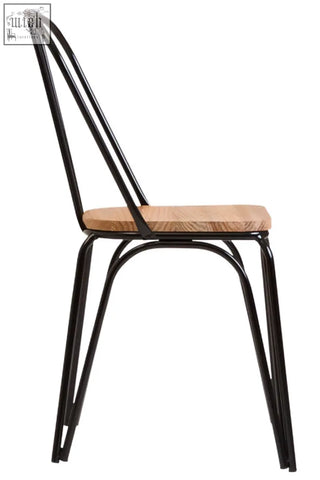 District dining chair with black metal frame and elm wood seat featuring a sleek industrial design