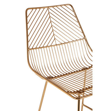 District gold metal wire bar chair with gold-toned tapered frame and modern geometric design