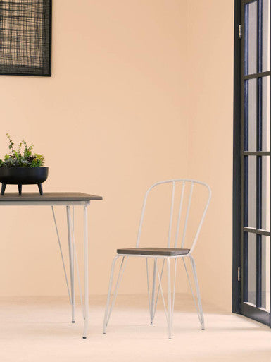 White metal chair with dark wooden seat paired with grey metal and elm wood dining table for wood dining use