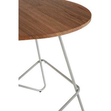 District grey metal and elm wood round dining table with slender metal legs in a rustic grey finish