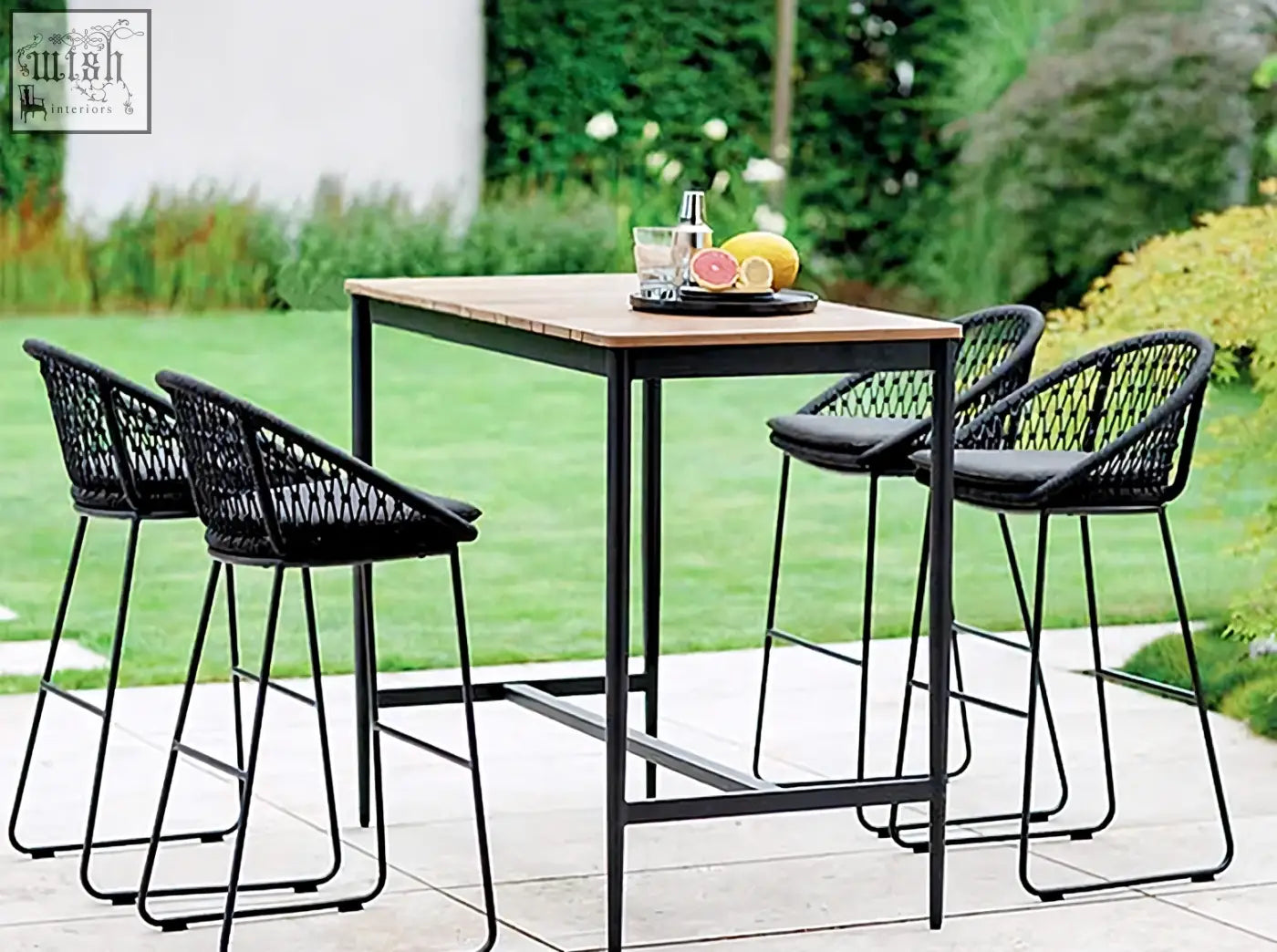 Black woven mesh bar stools with cushioned seats and metal legs from dmitry outdoor garden table set