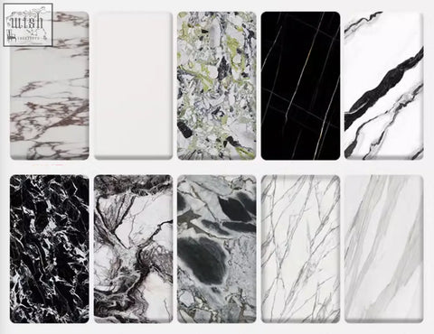 A collection of sintered stone marble samples with natural veining for a contemporary dining room dobson dining table