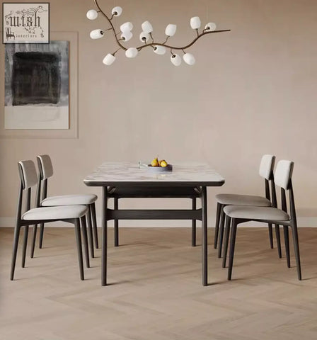Dobson dining table with sleek sintered stone marble top and dark wooden legs perfect for a modern dining room