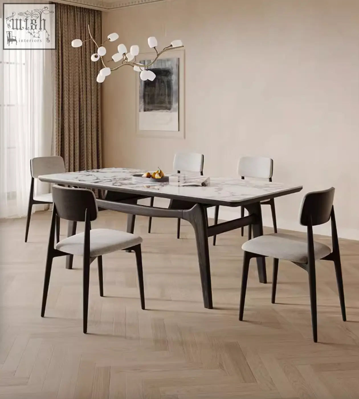 Dobson dining table with sleek sintered stone marble top and dark wood legs in a contemporary dining room setting