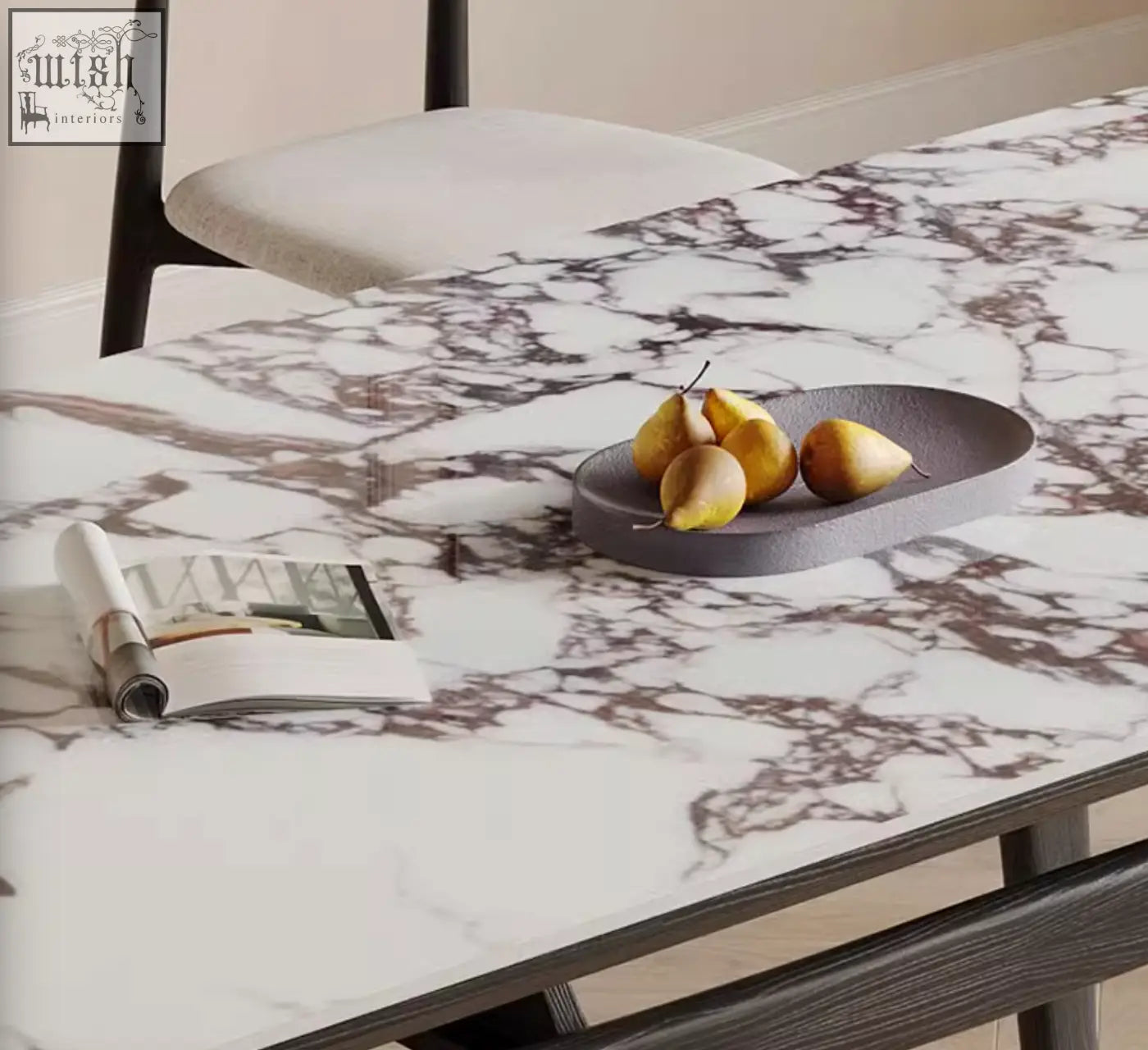 Sleek gray ceramic tray with yellow pears on dobson dining table with sintered stone top in dining room setup