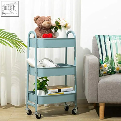 Light blue doe works metal storage trolley with three tiers and black wheels for kitchen or office use