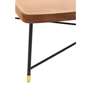A doha coffee table with a sleek wooden top and cross metal legs featuring gold-colored caps