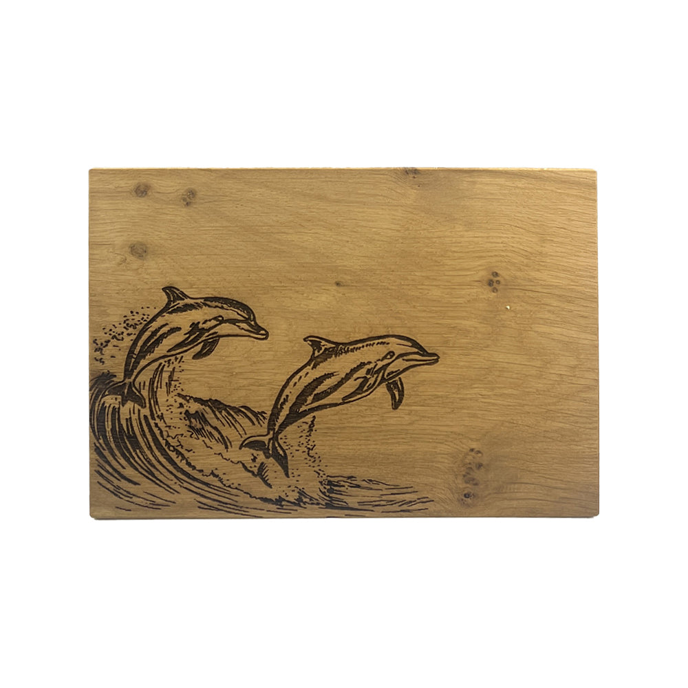 Rectangular light brown oak serving board with dark dolphin oak engraving perfect for cheese and snacks