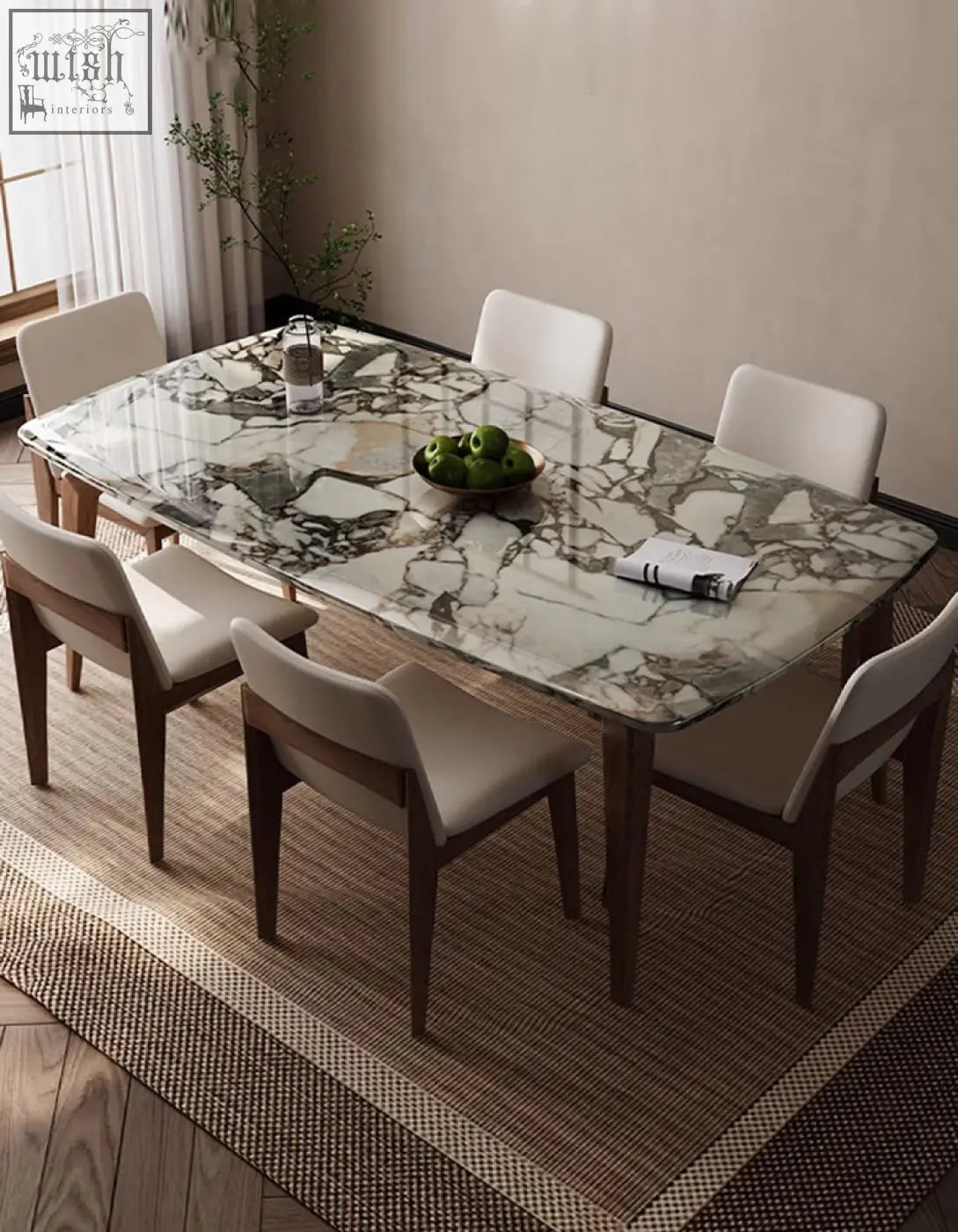 Dominic dining table featuring a marble top with natural gray and white veining perfect for any dining space