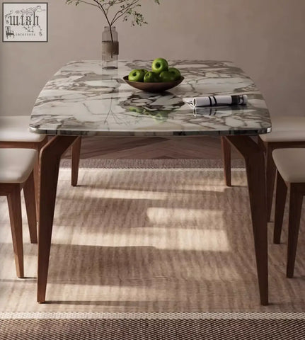 Dominic dining table with white and gray marble top and dark brown wood legs perfect for dining areas