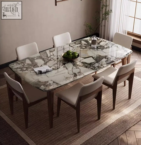 Dominic dining table with a marble top featuring natural gray and white veined texture perfect for any dining space
