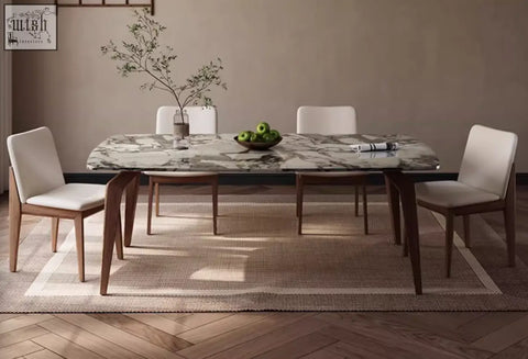 Marble dining table with dark wood legs and sleek modern design perfect for dining featuring dominic dining table style