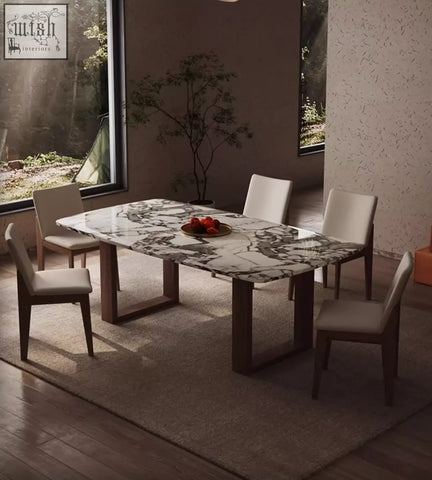 Donovan dining table with marble texture top, dark wood legs, and light gray fabric chairs for stylish dining room