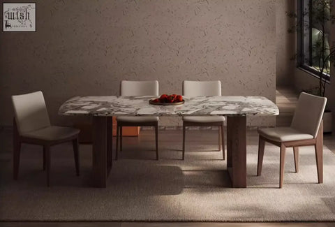 Elegant donovan dining table with white and gray marble top and dark wood legs surrounded by matching chairs