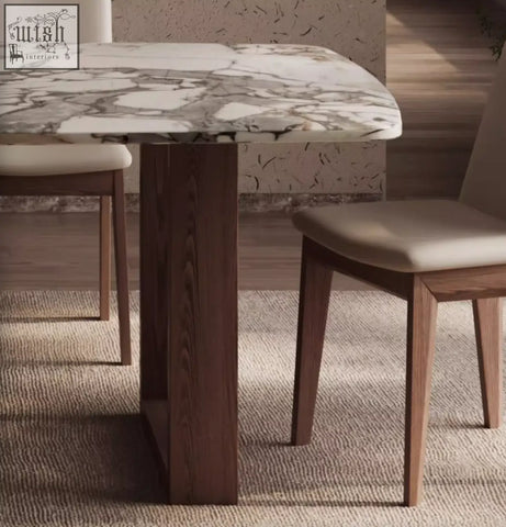 Modern donovan dining table with white and gray marble top and dark wood legs perfect as a stylish dining table
