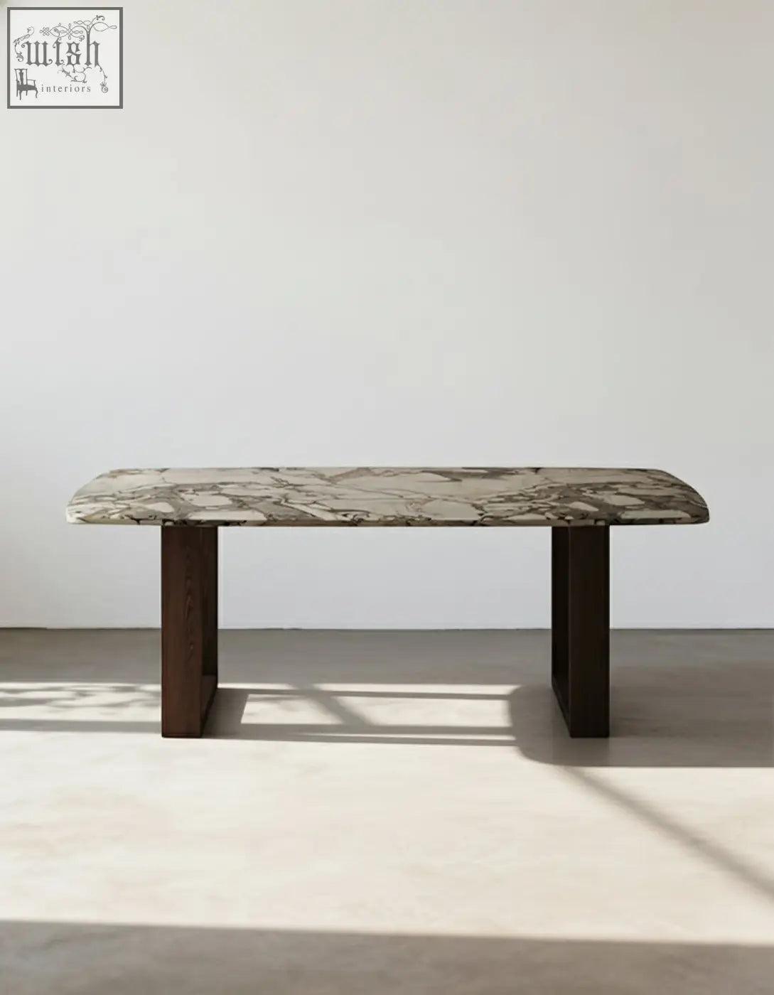 Donovan dining table marble with a sleek gray and white marble top and sturdy dark wood legs modern dining table