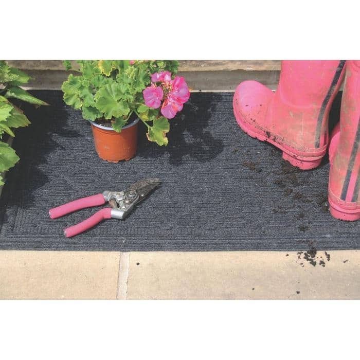Black textured entrance doormat with diamond design pattern for durable indoor outdoor use