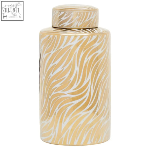 A doria large white ceramic jar with gold finish and matching lid featuring an elegant white zebra-striped pattern