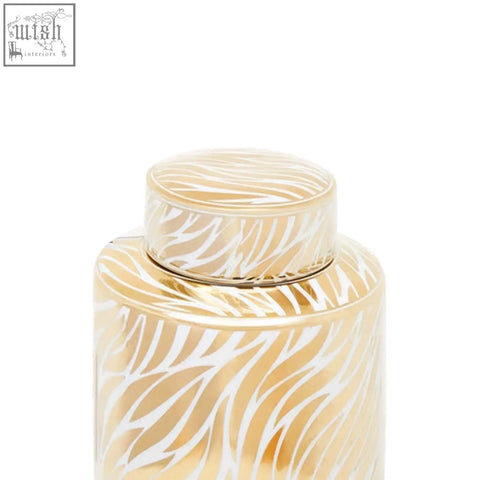 Doria large white ceramic jar with a gold-toned finish and white zebra-striped pattern with matching lid