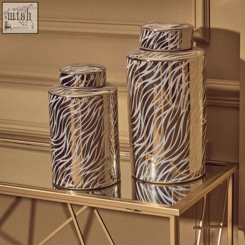 Two metallic ceramic jars with zebra-striped patterns in white and gold finish doria large white ceramic jar set