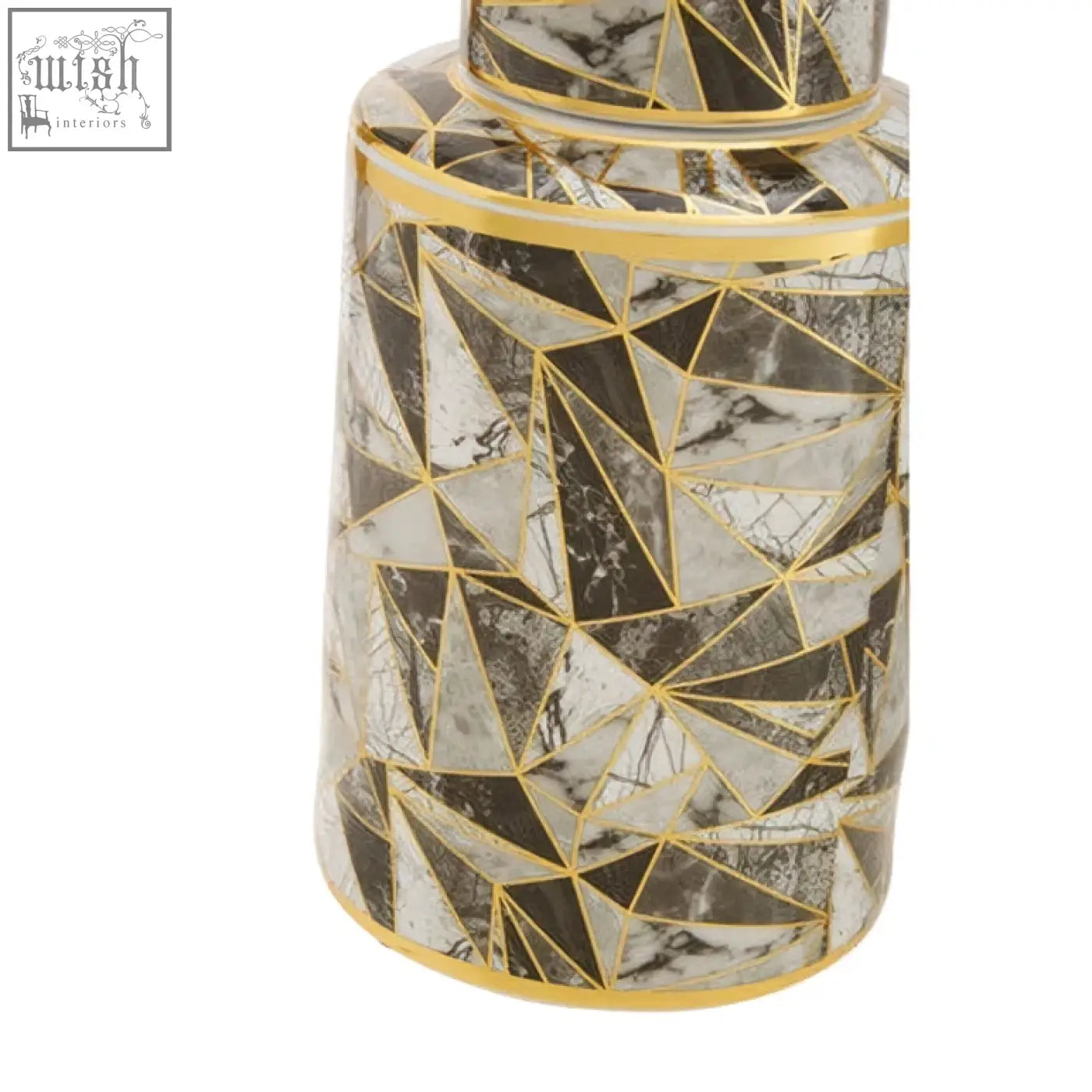A sleek ceramic jar with a black and white marble effect pattern and gold geometric outlines called doria small jar