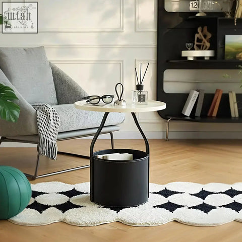 Black cylindrical dottie portable storage basket with sleek modern design and smooth finish for side table use with sintered stone