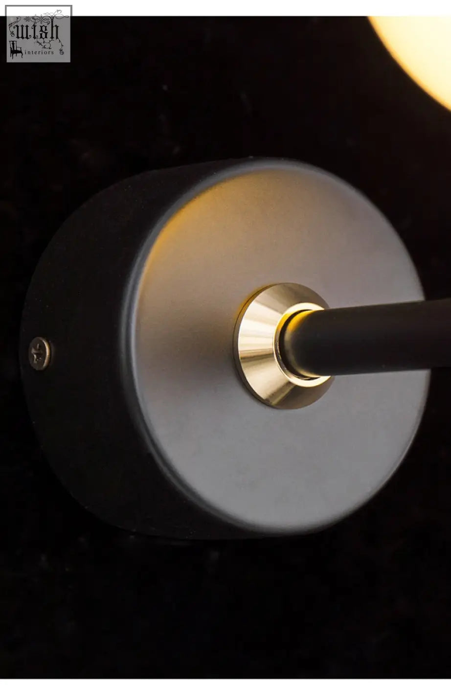 Black cylindrical double chirpy led wall light with brushed brass accent and matte finish for bird nursery use