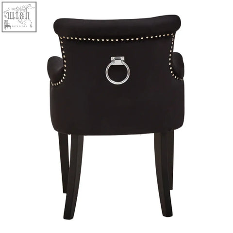 Doucet black velvet dining chair with ring back featuring silver nailhead trim and central ring handle